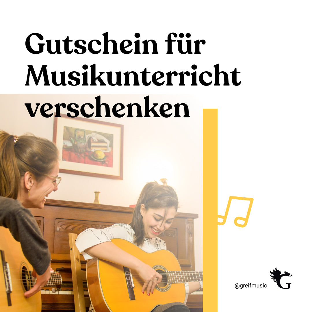 Gutschein für Gitarrenunterricht. Zwei junge Frauen spielen Gitarre und lachen.